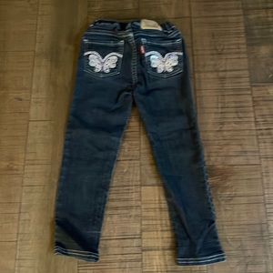 Levi’s blue jeans with butterflies on back pockets, girls size 3-4Y